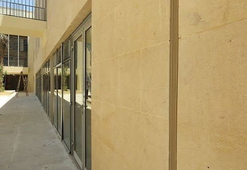 This image depicts an exterior view of a commercial wall expansion joint. 